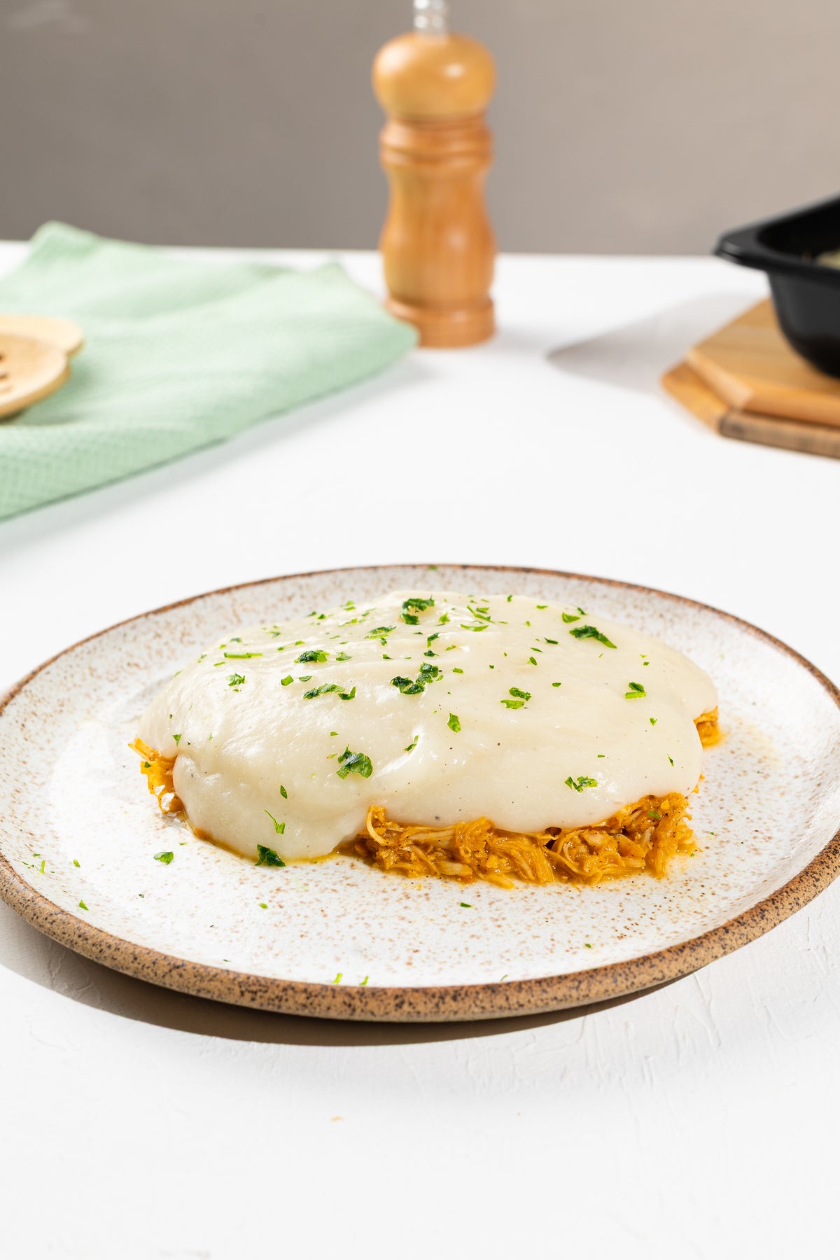 Escondidinho de aipim com frango desfiado