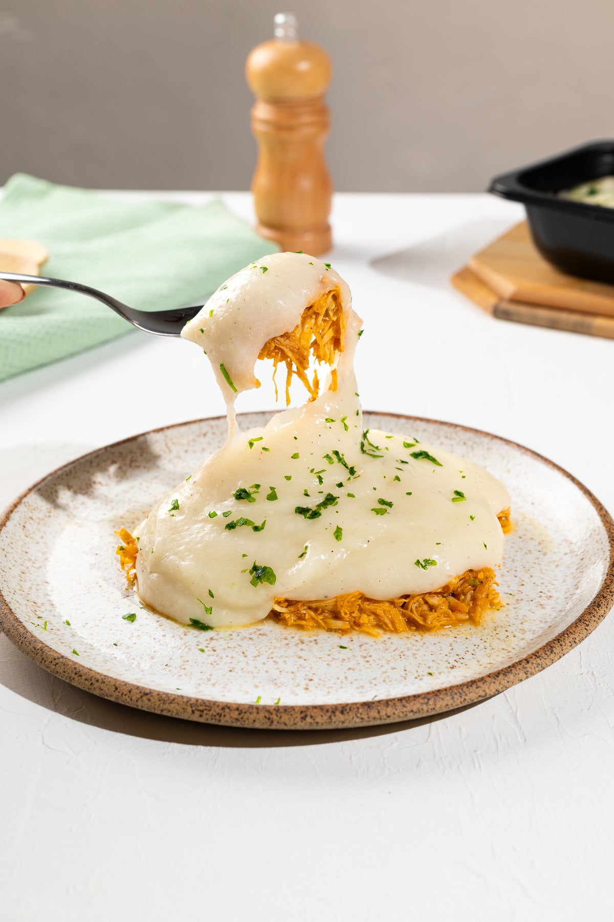 Escondidinho de aipim com frango desfiado